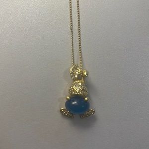 gold necklace bunny pendant with blue crystal and diamond accents